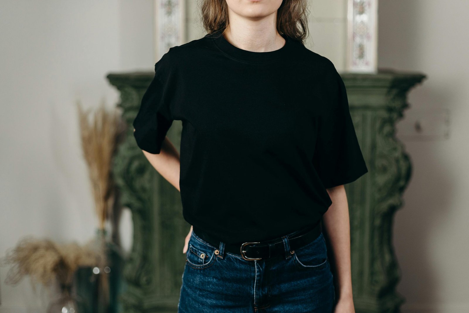 Black organic T-shirt worn with denim