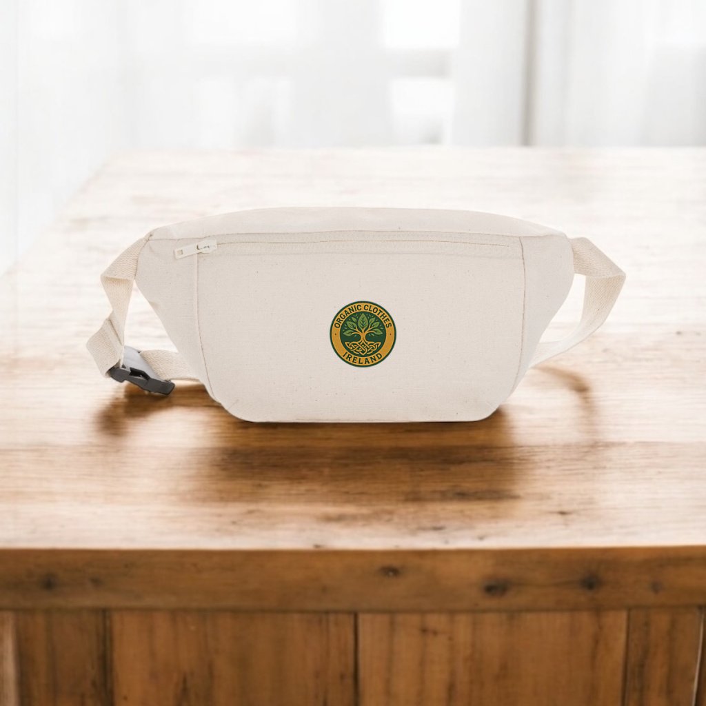 Organic Badge cream hip bag on a wooden table